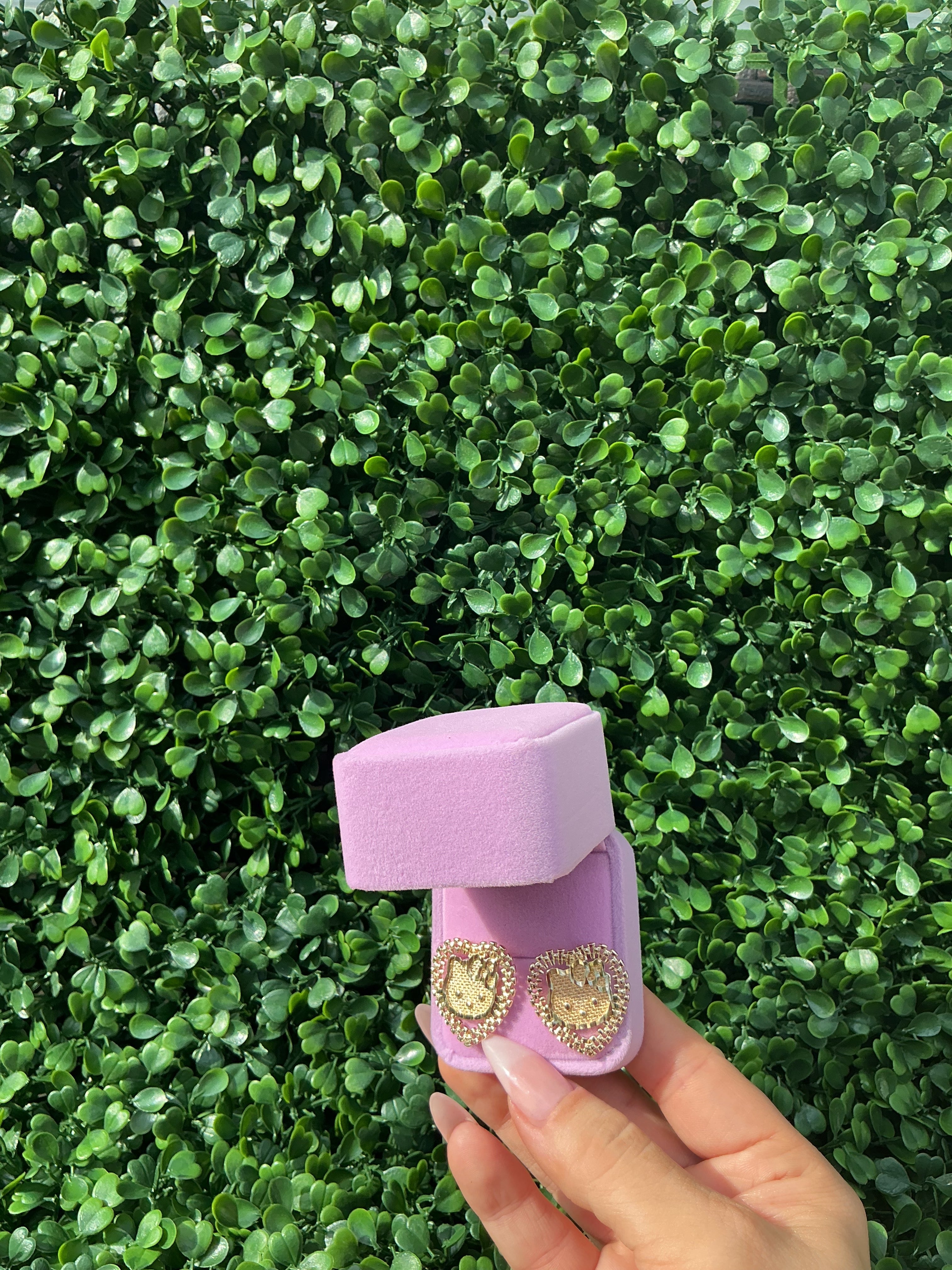 HK face Rolex heart studs